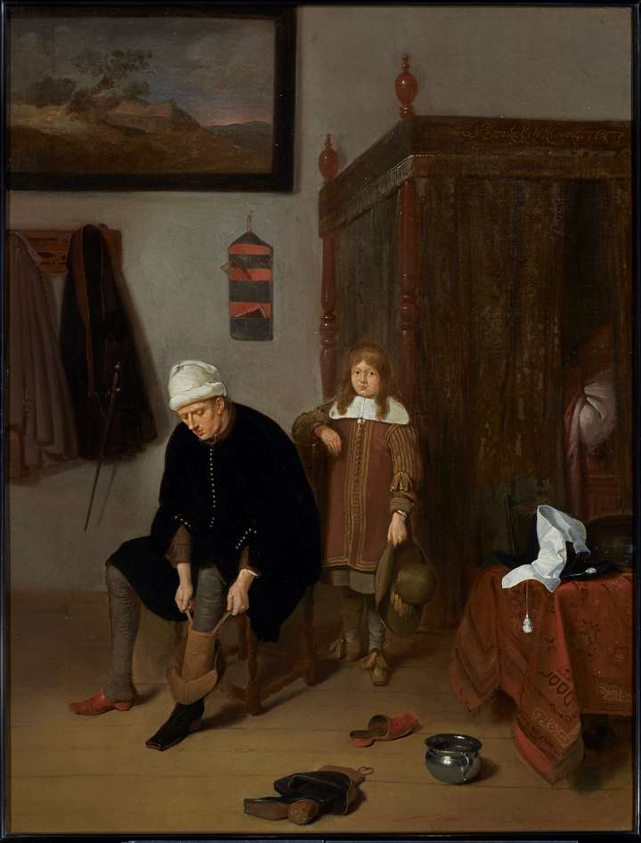 Interior with a Gentleman pulling on his Boots, with his page standing by
